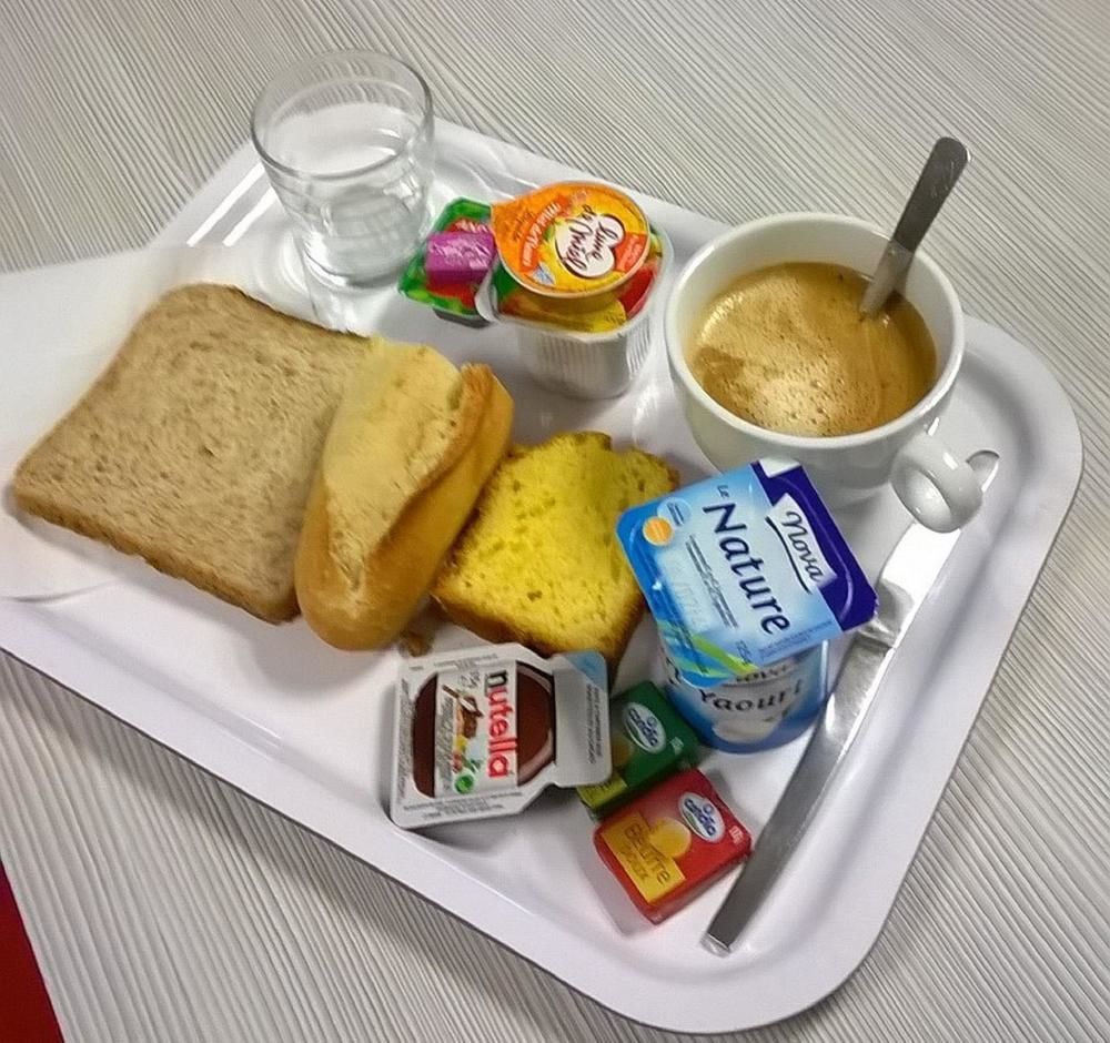 Premiere Classe Évreux Eksteriør billede A typical breakfast in France